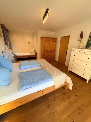 Ein Bett oder Betten in einem Zimmer der Unterkunft Wohnung Oberadelsberg