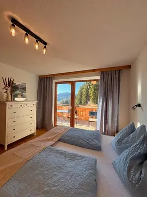 Ein Bett oder Betten in einem Zimmer der Unterkunft Wohnung Oberadelsberg