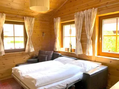 Ein Bett oder Betten in einem Zimmer der Unterkunft Holiday Home Haus Barbara in Aschau im Zillertal by Interhome