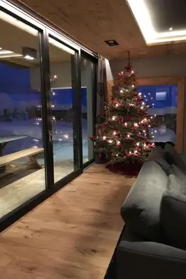 Ein Sitzbereich in der Unterkunft Holiday Home Chalet Tannweg in Sankt Johann in Tirol by Interhome
