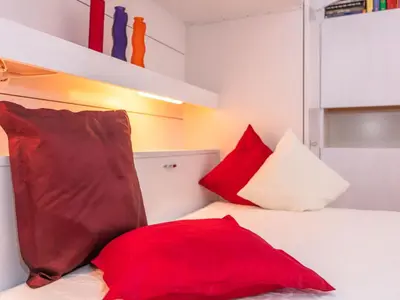 Ein Bett oder Betten in einem Zimmer der Unterkunft Apartment Idylle by Interhome