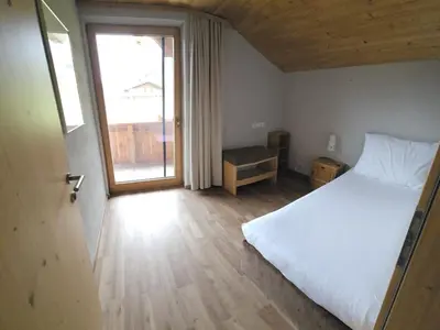 Ein Bett oder Betten in einem Zimmer der Unterkunft Apartment Kröller by Interhome