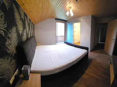 Ein Bett oder Betten in einem Zimmer der Unterkunft Apartment Kröller by Interhome