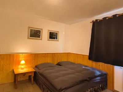 Ein Bett oder Betten in einem Zimmer der Unterkunft Zillertal Alpenblick