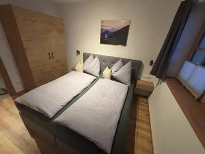Ein Bett oder Betten in einem Zimmer der Unterkunft Apartment Bichlhof