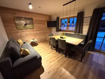 Ein Sitzbereich in der Unterkunft Apartment Bichlhof