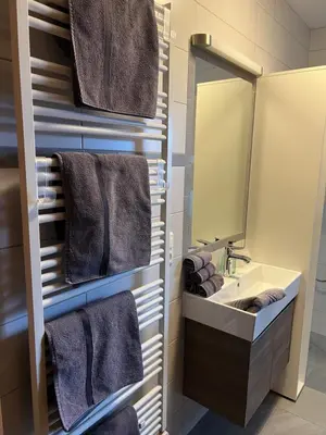 Ein Bett oder Betten in einem Zimmer der Unterkunft Ferienwohnung Jaspis - Scheffau am Wilden Kaiser