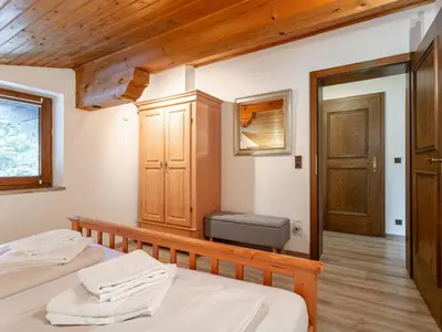 Ein Bett oder Betten in einem Zimmer der Unterkunft FamilienLodge Reith
