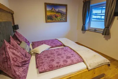 Ein Bett oder Betten in einem Zimmer der Unterkunft Appartement Aichner