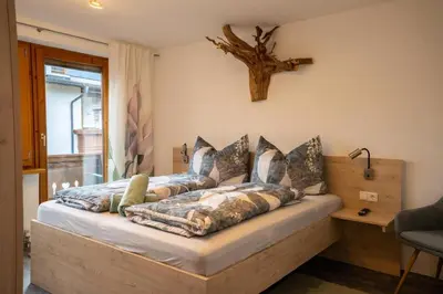 Ein Bett oder Betten in einem Zimmer der Unterkunft Apart Laimböck