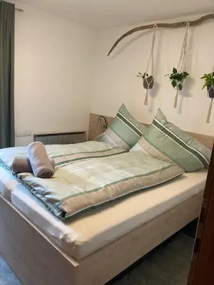 Ein Bett oder Betten in einem Zimmer der Unterkunft Apart Laimböck