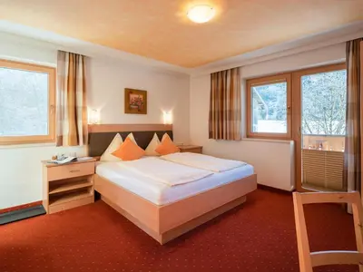 Ein Bett oder Betten in einem Zimmer der Unterkunft Mühlhof