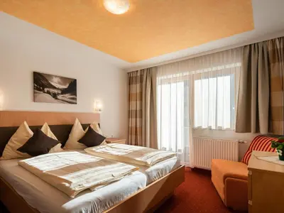 Ein Bett oder Betten in einem Zimmer der Unterkunft Mühlhof