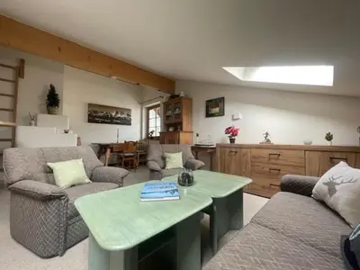 Ein Sitzbereich in der Unterkunft CosyKitz Apartment