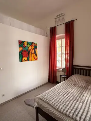 Ein Bett oder Betten in einem Zimmer der Unterkunft Villa Tirala
