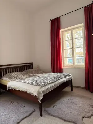 Ein Bett oder Betten in einem Zimmer der Unterkunft Villa Tirala