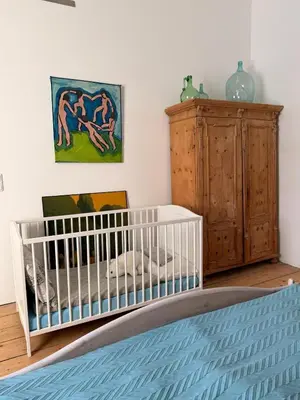 Ein Bett oder Betten in einem Zimmer der Unterkunft Villa Tirala