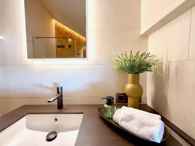 Ein Badezimmer in der Unterkunft INFINITY SKY LODGE by belle-stay HEATED POOL, SAUNA and LIFT