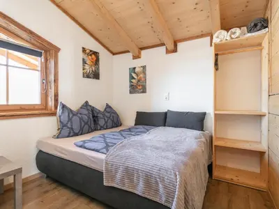 Ein Bett oder Betten in einem Zimmer der Unterkunft Katie