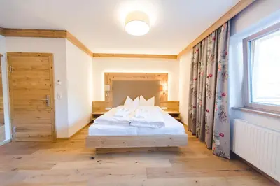 Ein Bett oder Betten in einem Zimmer der Unterkunft Hotel Giessenbach