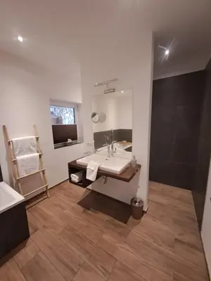 Ein Bett oder Betten in einem Zimmer der Unterkunft Panorama Appartements Filzerhof Weitblick & Sonnenseite
