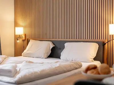 Ein Bett oder Betten in einem Zimmer der Unterkunft Brixen Alpin Living Top 19