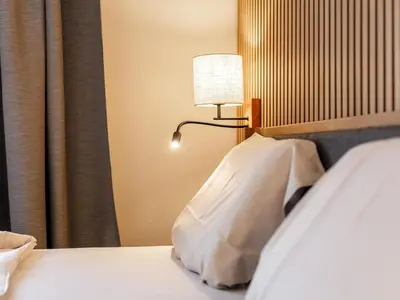 Ein Bett oder Betten in einem Zimmer der Unterkunft Brixen Alpin Living Top 19
