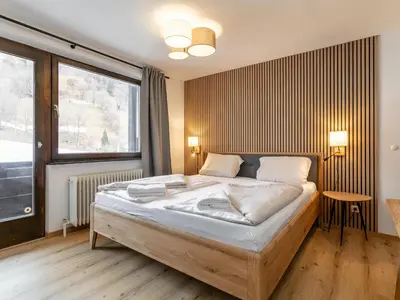 Ein Bett oder Betten in einem Zimmer der Unterkunft Brixen Alpin Living Top 19