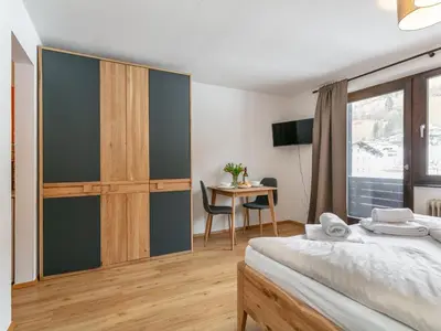 Ein Bett oder Betten in einem Zimmer der Unterkunft Brixen Alpin Living Top 18