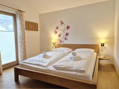 Ein Bett oder Betten in einem Zimmer der Unterkunft Chalet Noriker