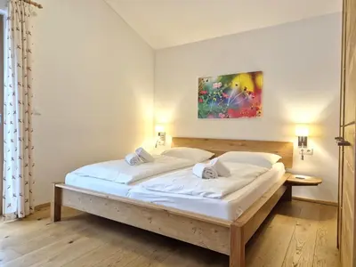 Ein Bett oder Betten in einem Zimmer der Unterkunft Chalet Noriker