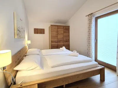 Ein Bett oder Betten in einem Zimmer der Unterkunft Chalet Noriker
