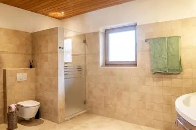 Ein Badezimmer in der Unterkunft Alps Living Söll