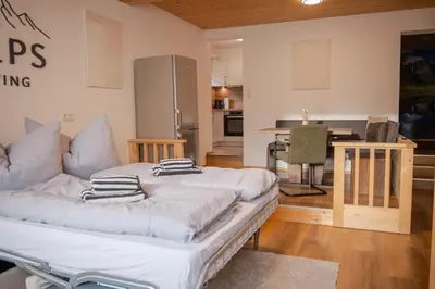 Ein Bett oder Betten in einem Zimmer der Unterkunft Alps Living Söll