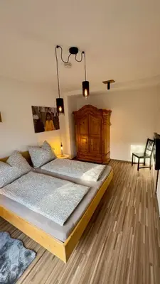 Ein Bett oder Betten in einem Zimmer der Unterkunft SCHILLING stay&more