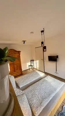 Ein Bett oder Betten in einem Zimmer der Unterkunft SCHILLING stay&more