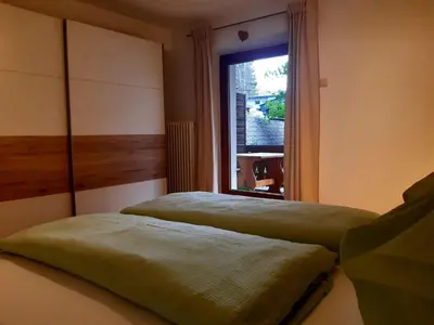 Ein Bett oder Betten in einem Zimmer der Unterkunft Ferienwohnung Eckschlager