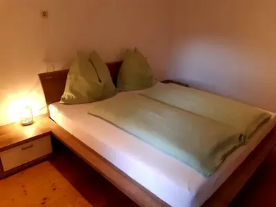 Ein Bett oder Betten in einem Zimmer der Unterkunft Ferienwohnung Eckschlager