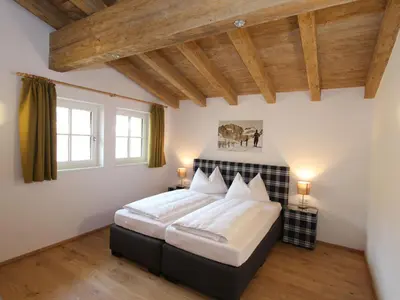 Ein Bett oder Betten in einem Zimmer der Unterkunft Chalet in Saalbach by Ski Lift & Slopes