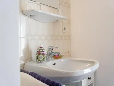 Ein Badezimmer in der Unterkunft Nussbaumer S