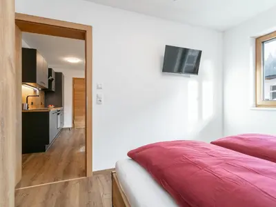 Ein Bett oder Betten in einem Zimmer der Unterkunft oberhAUSZEIT