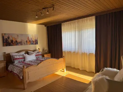 Ein Bett oder Betten in einem Zimmer der Unterkunft Haus im Zillertal - Alpen Lodge 52