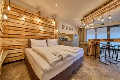 Ein Bett oder Betten in einem Zimmer der Unterkunft Appartement Bretterbude