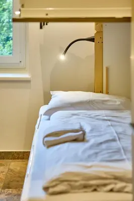 Ein Bett oder Betten in einem Zimmer der Unterkunft Appartement Bretterbude