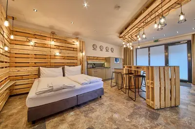 Ein Bett oder Betten in einem Zimmer der Unterkunft Appartement Bretterbude