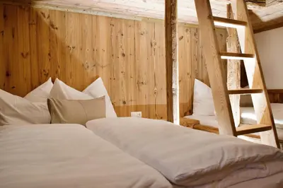 Ein Bett oder Betten in einem Zimmer der Unterkunft Chalet Schernthann
