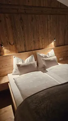 Ein Bett oder Betten in einem Zimmer der Unterkunft Chalet Schernthann