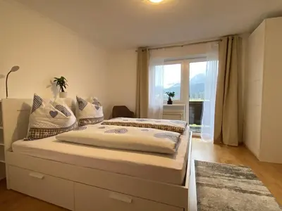 Ein Bett oder Betten in einem Zimmer der Unterkunft Lucy's Panorama Apartment