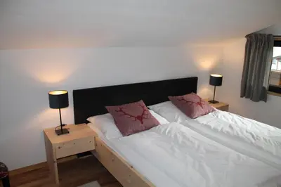 Ein Bett oder Betten in einem Zimmer der Unterkunft Chalet am wilden Kaiser