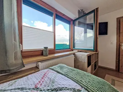 Ein Bett oder Betten in einem Zimmer der Unterkunft Apartment August by Interhome